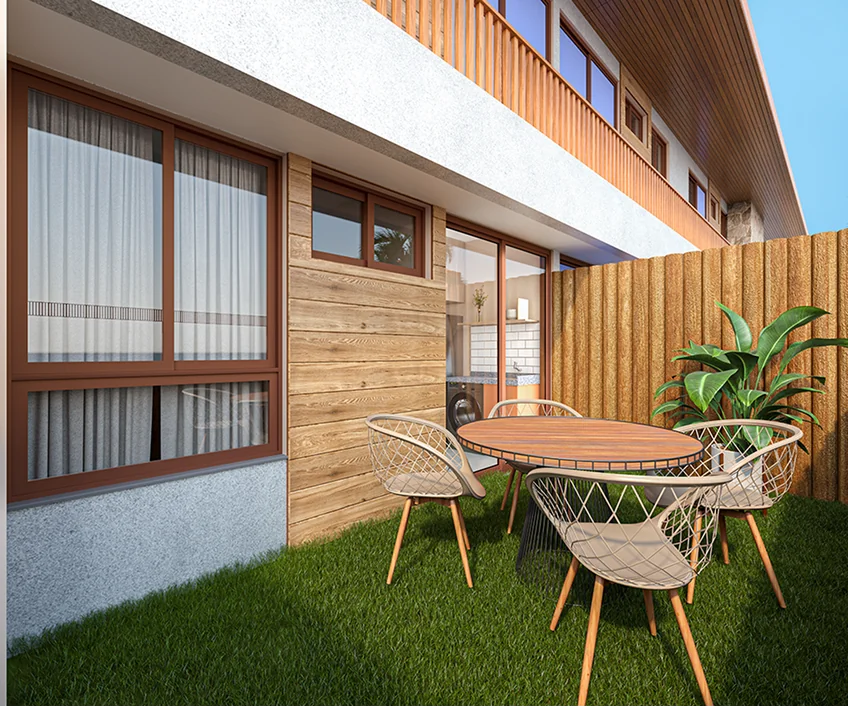 Unidade Térrea com Garden Privativo: área externa com gramado e mesa